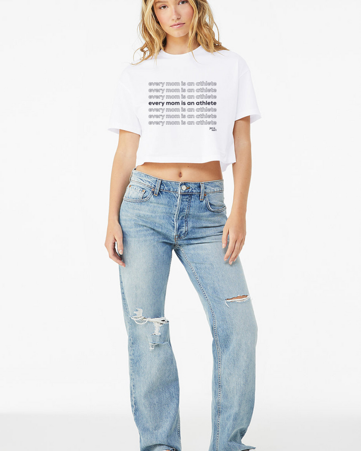White short sleeve crew neck cropped t-shirt with every mom is an athlete front